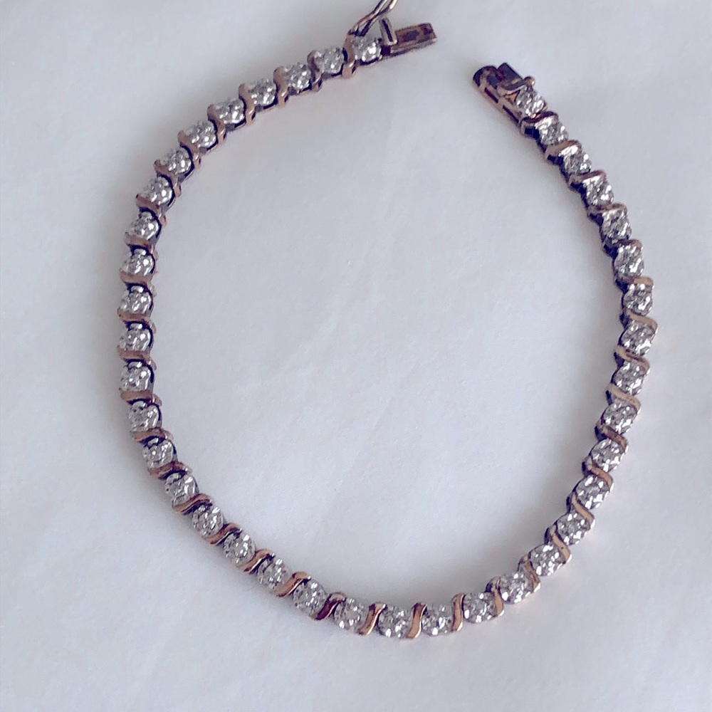 Gold over sterling tennis  bracelet